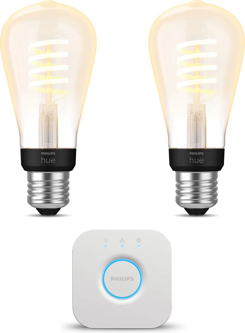 Starterspakket - E27 - met 2 Filament Edisonlampen Klein (ST64) - Warm tot Koelwit Licht - Incl. 1 Hue Bridge - Hue White Ambiance Filament by Philips Hue in Gold – product photo