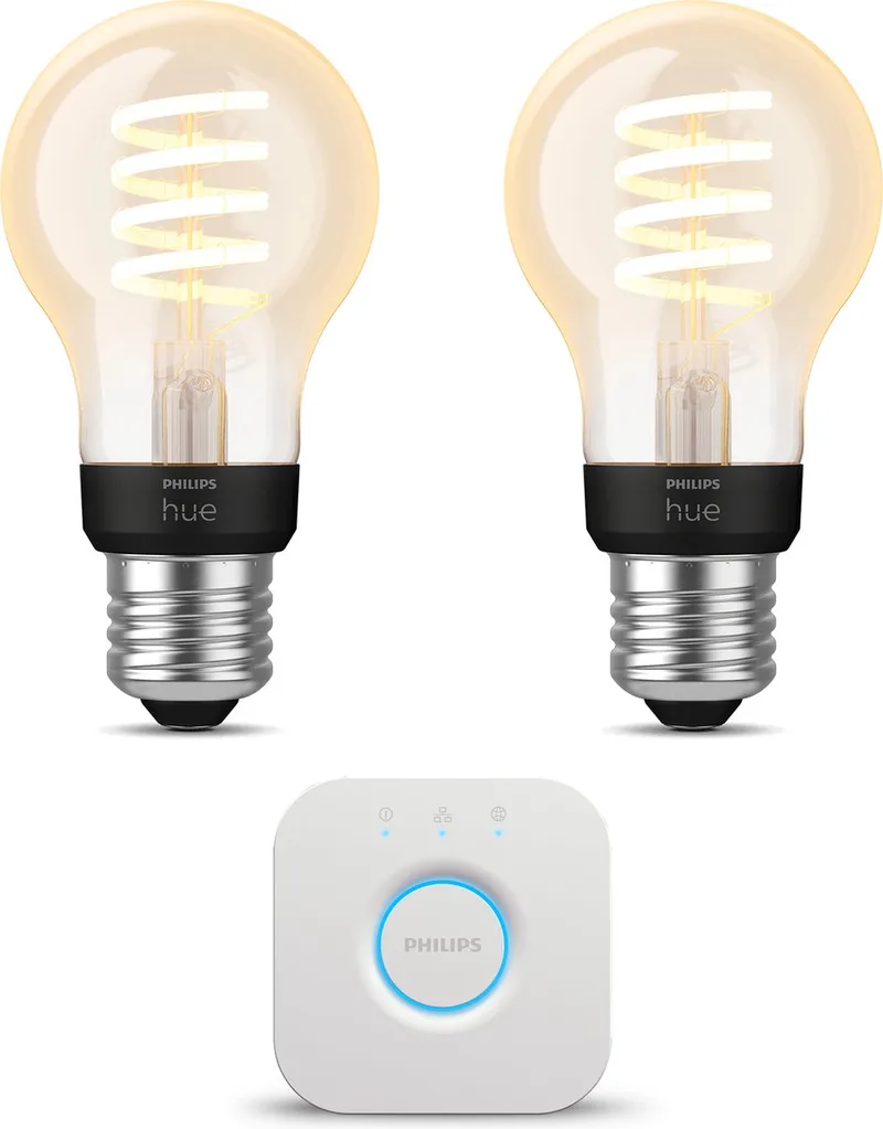 Starterspakket - E27 - met 2 Filament Standaard Lampen (A60) - Warm tot Koelwit Licht - Incl. 1 Hue Bridge - Hue White Ambiance Filament van Philips Hue in Goud – productfoto