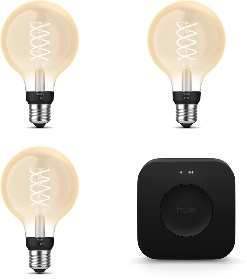 Starterspakket - E27 - met 3 Filament Globelampen Klein (G93) - Warmwit Licht - Incl. 1 Hue Bridge Pro - Hue White Filament från Philips Hue i Guld – produktbild